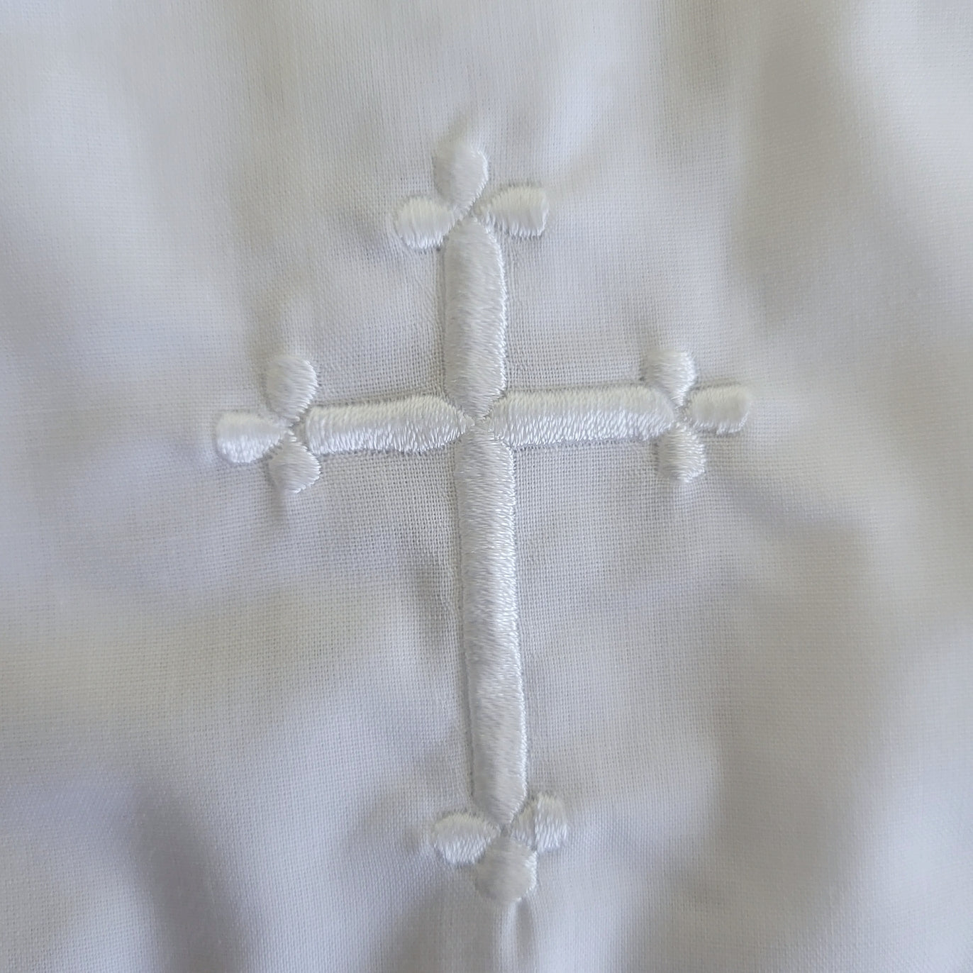 Petit Ami Embroidered Cross Christening Bib