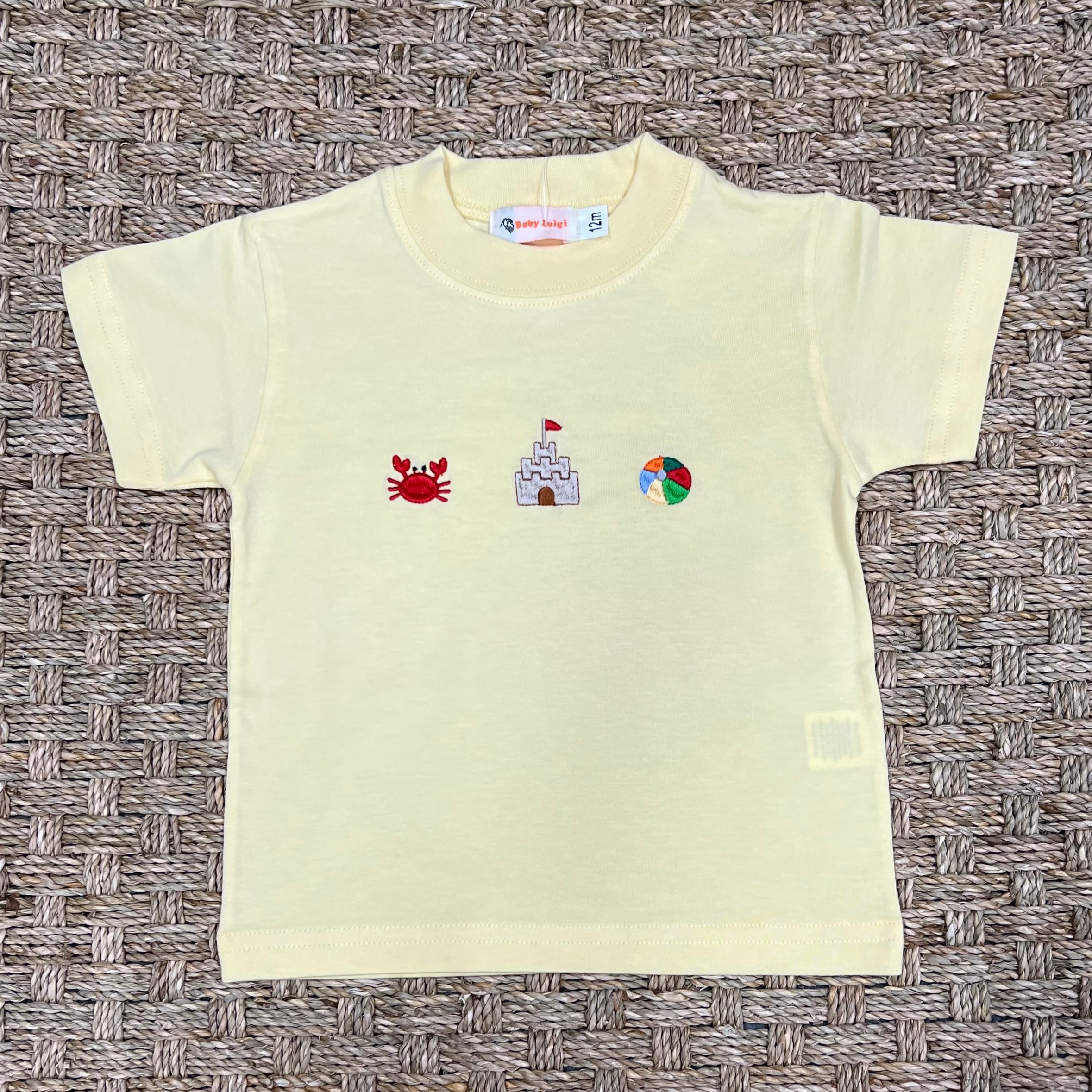 Luigi Tee, Crab Sandcastle & Beach Ball on Pale Yellow