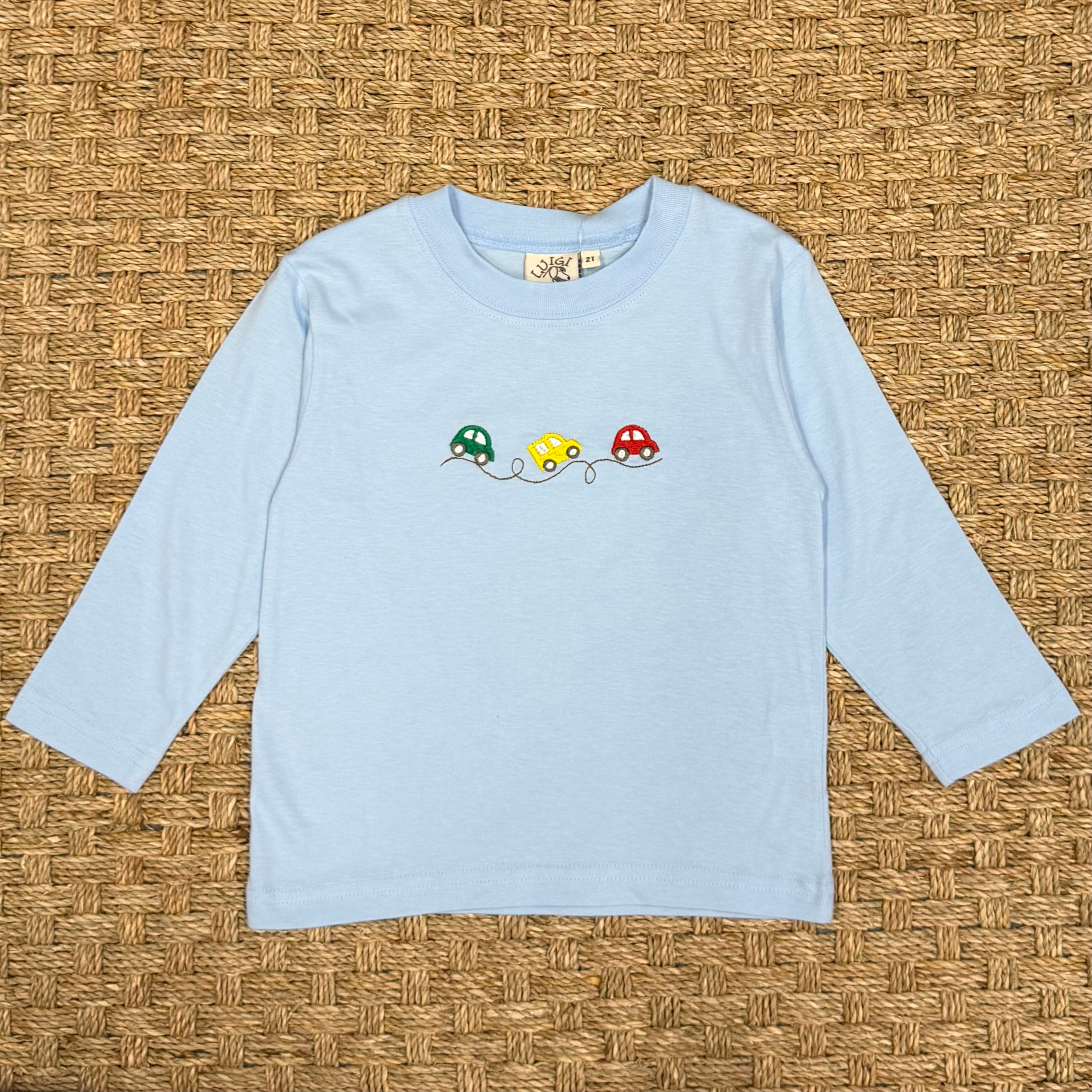 Luigi Tee, Three Car Icons on Light Sky Blue