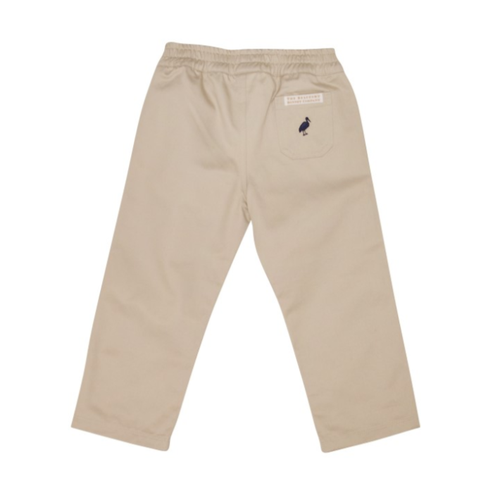 Beige pants with a small logo on a white background