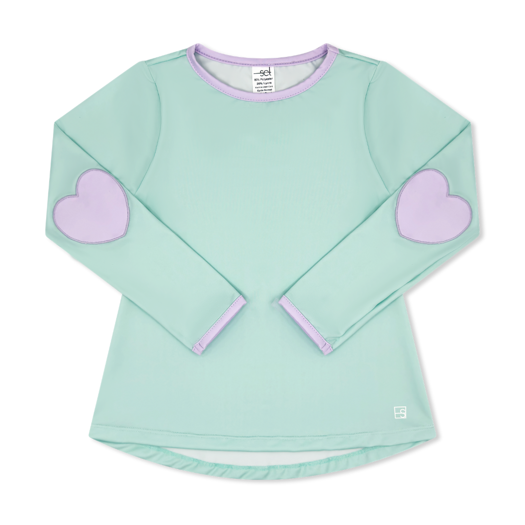 Mint long-sleeve shirt with purple heart elbow patches on a white background